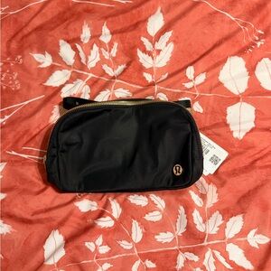 lululemon athletica Black Cosmetic Bag with Gold Zipper